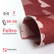Feltro Stampato Fantasia Natalizia50x50cm 2mm Sfondo Rosso Cuori Misti Fantasia Scritte Merry Christmas COD.08